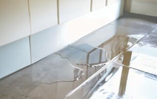 Signs of Water Damage Under Tile (and What to Do About It)